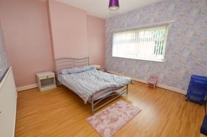 Bedroom One- click for photo gallery